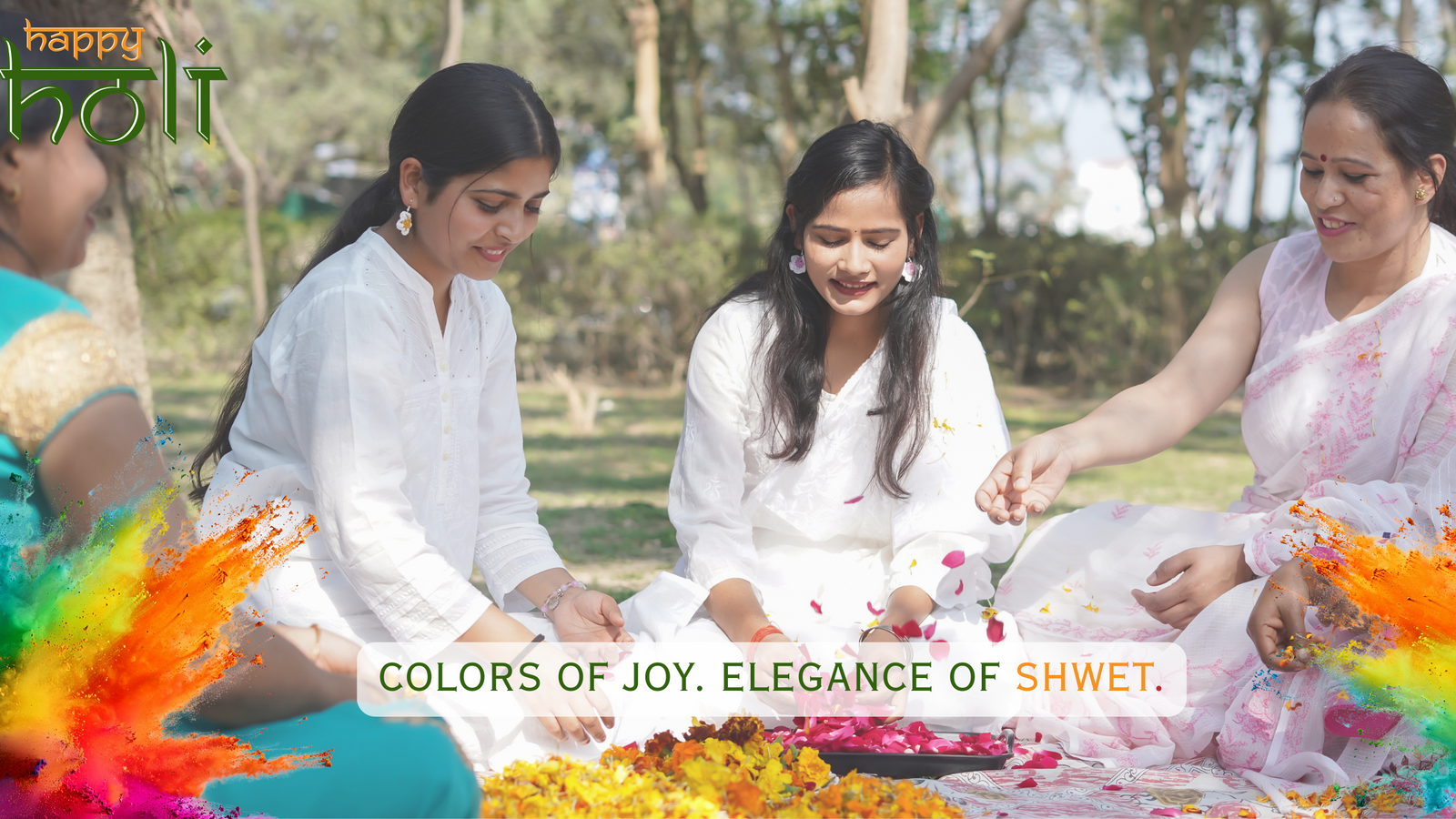 People celebrating Holi with colorful powder and flowers outdoors.