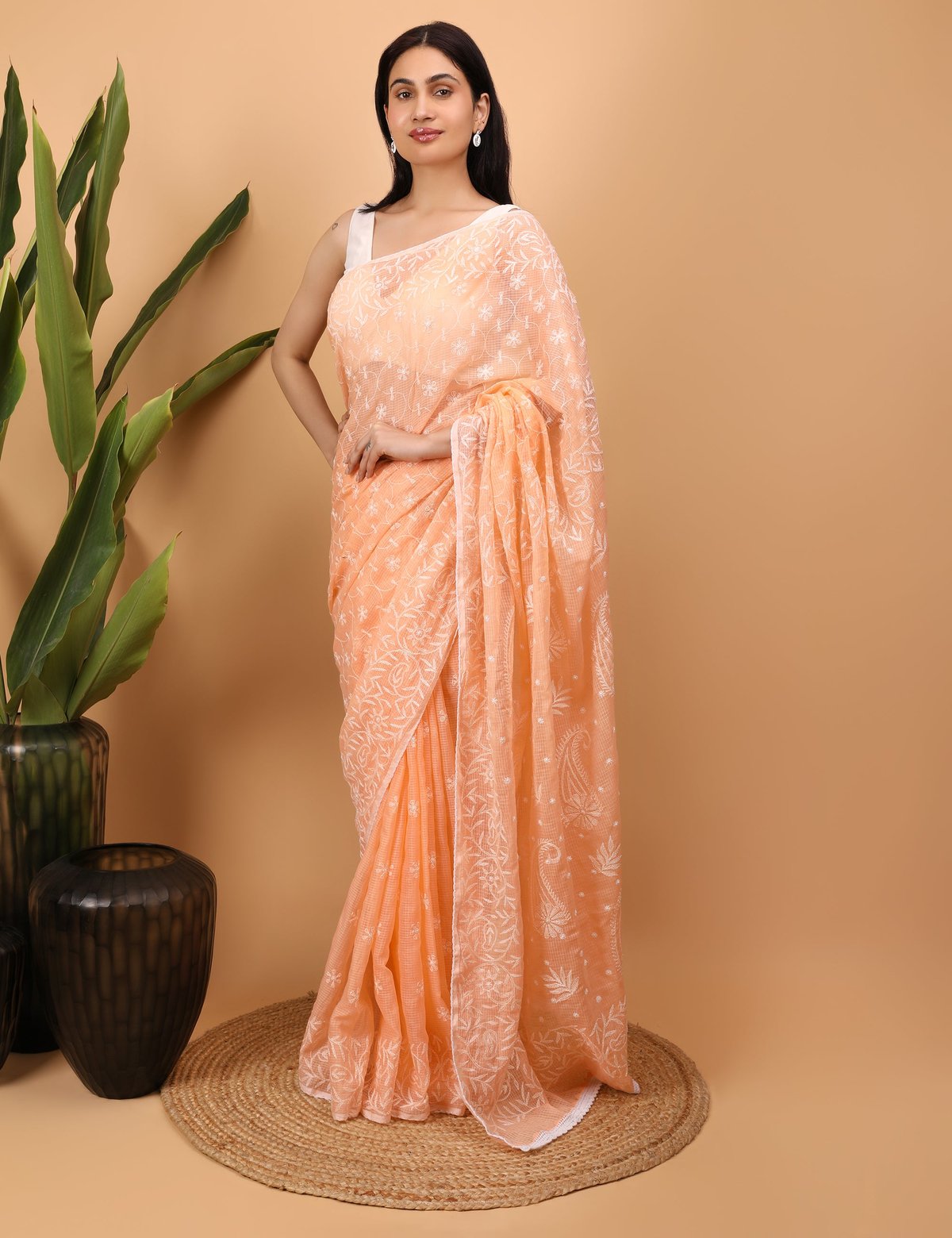 Shwet Peach Kota Cotton Chikankari Saree - Handcrafted Chikankari embroidery, styling example. Premium quality fabric.