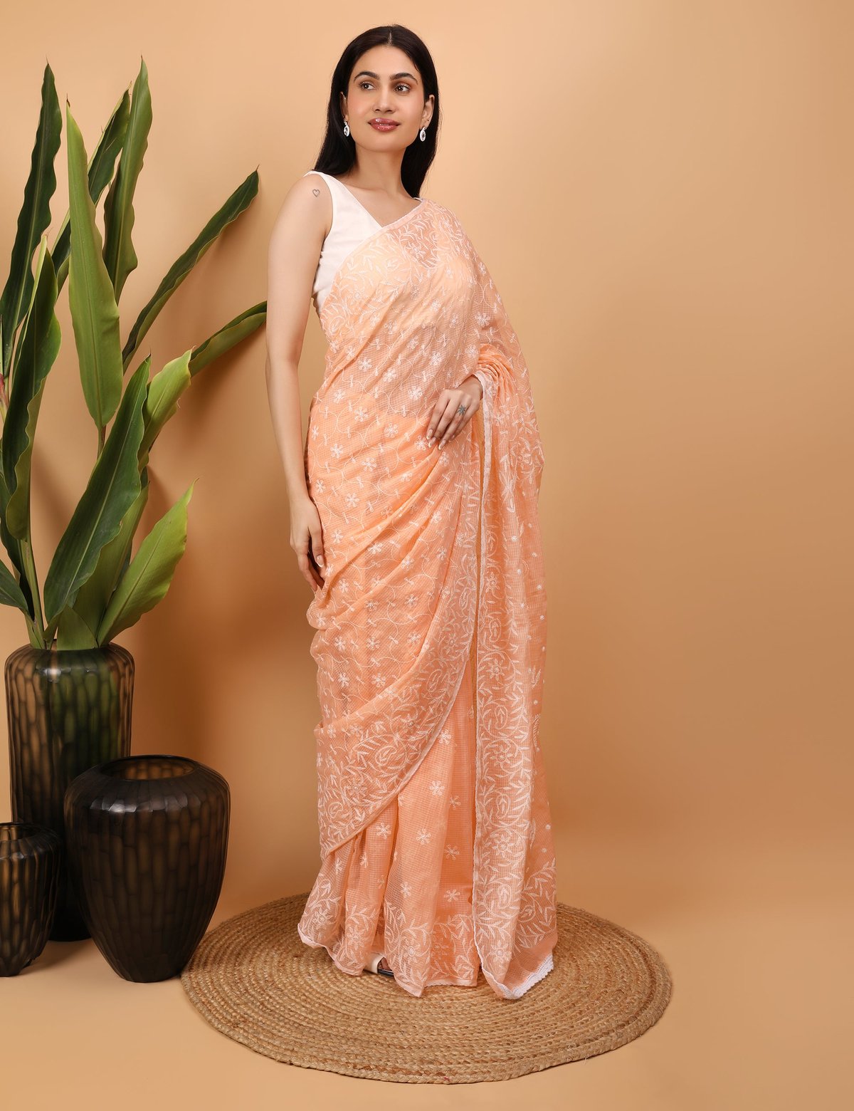 Shwet Peach Kota Cotton Chikankari Saree - Handcrafted Chikankari embroidery. Premium quality fabric.