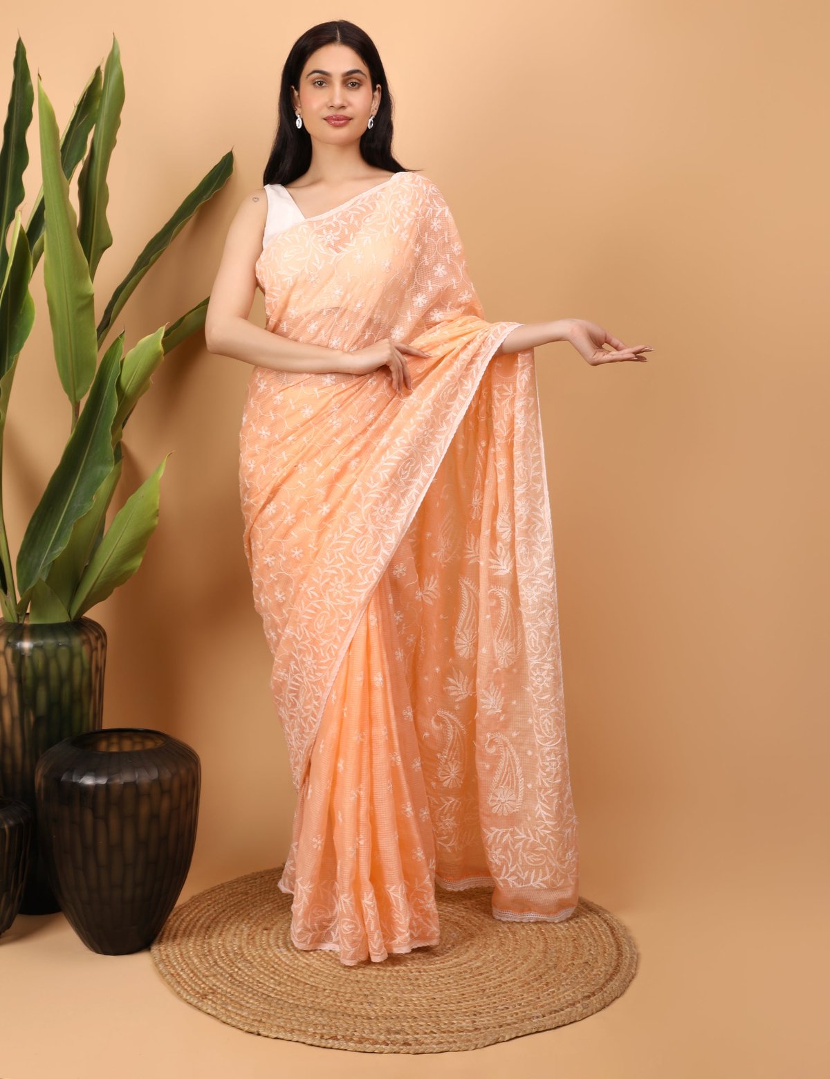 Shwet Peach Kota Cotton Chikankari Saree - Handcrafted Chikankari embroidery. Premium quality fabric.