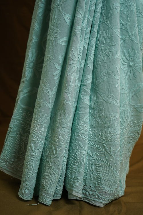 shwet cyan blue georgette chikankari saree - Handcrafted Chikankari embroidery, styling example. Premium quality fabric.