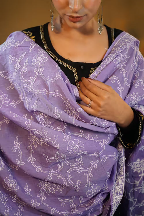 Person wearing a purple embroidered Chikankari dupatta with a blurred background