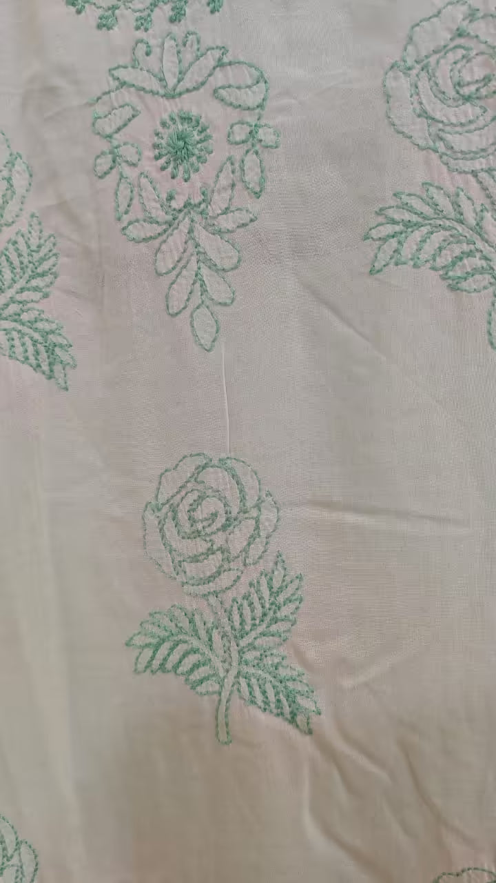 Hand Embroidered green floral patterns on beige fabric