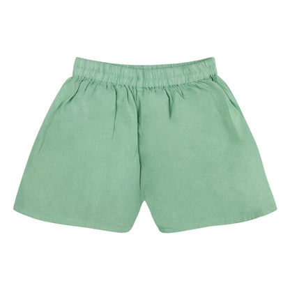 Green shorts on a white background
