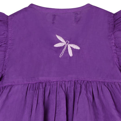 Purple dress with a white dragonfly design on the back