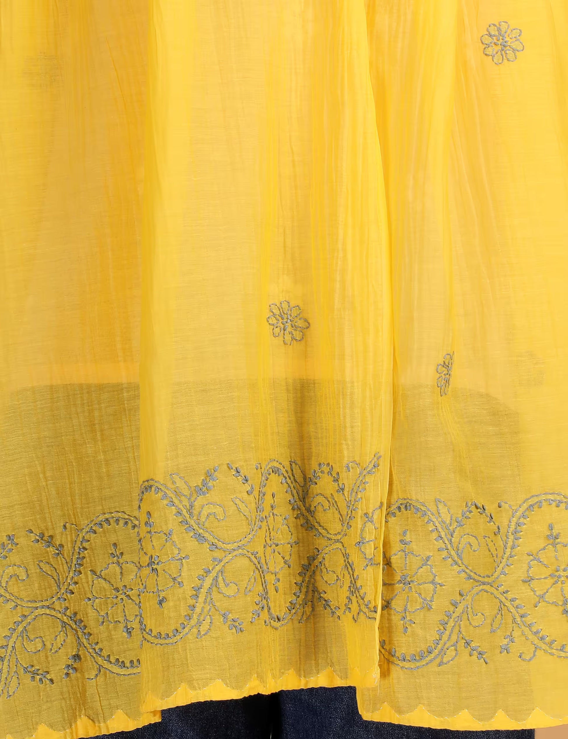 Yellow fabric with intricate blue Hand Embroidered Chikankari