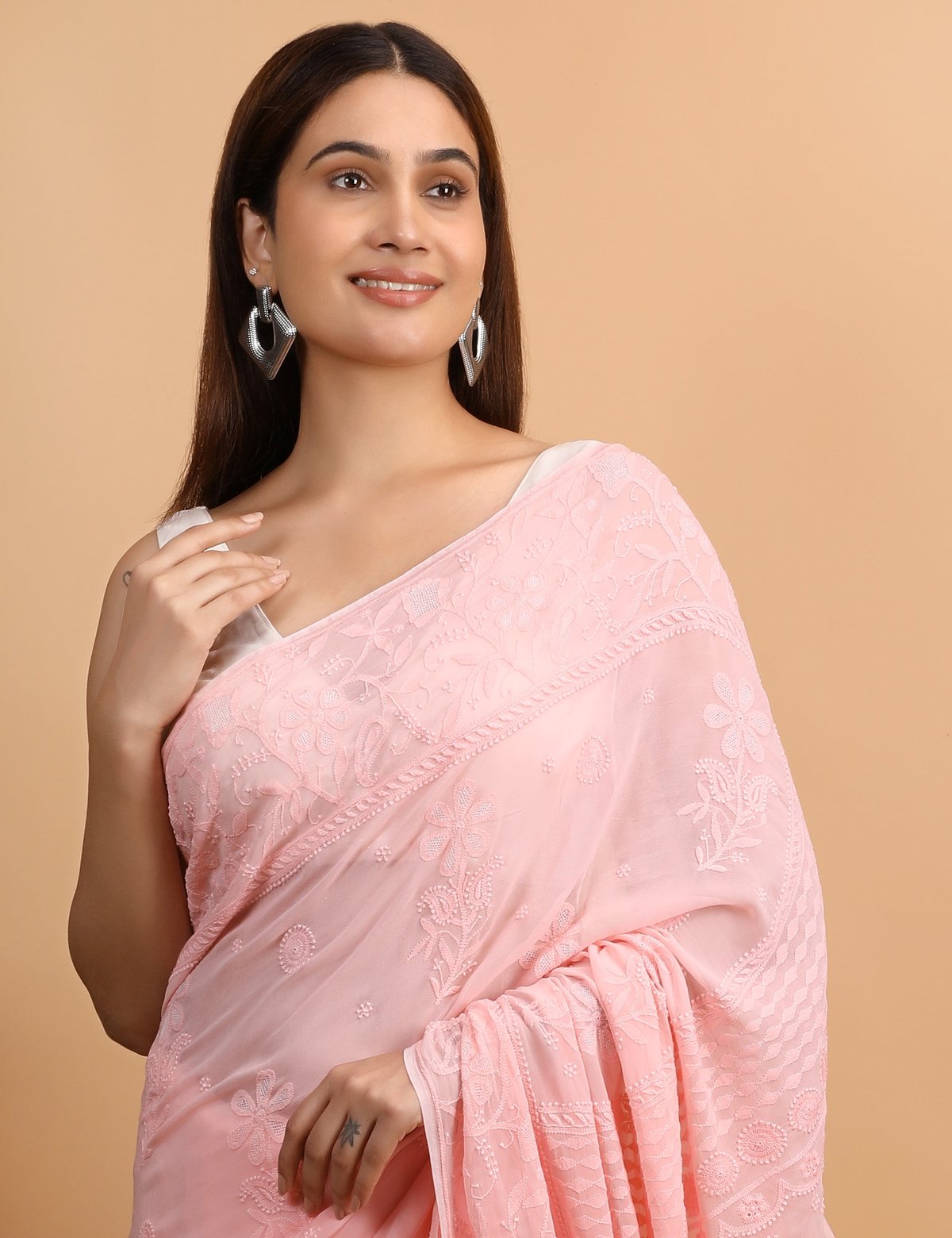 Shwet Peach Viscose Georgette Chikankari Saree - Handcrafted Chikankari embroidery. Premium quality fabric.
