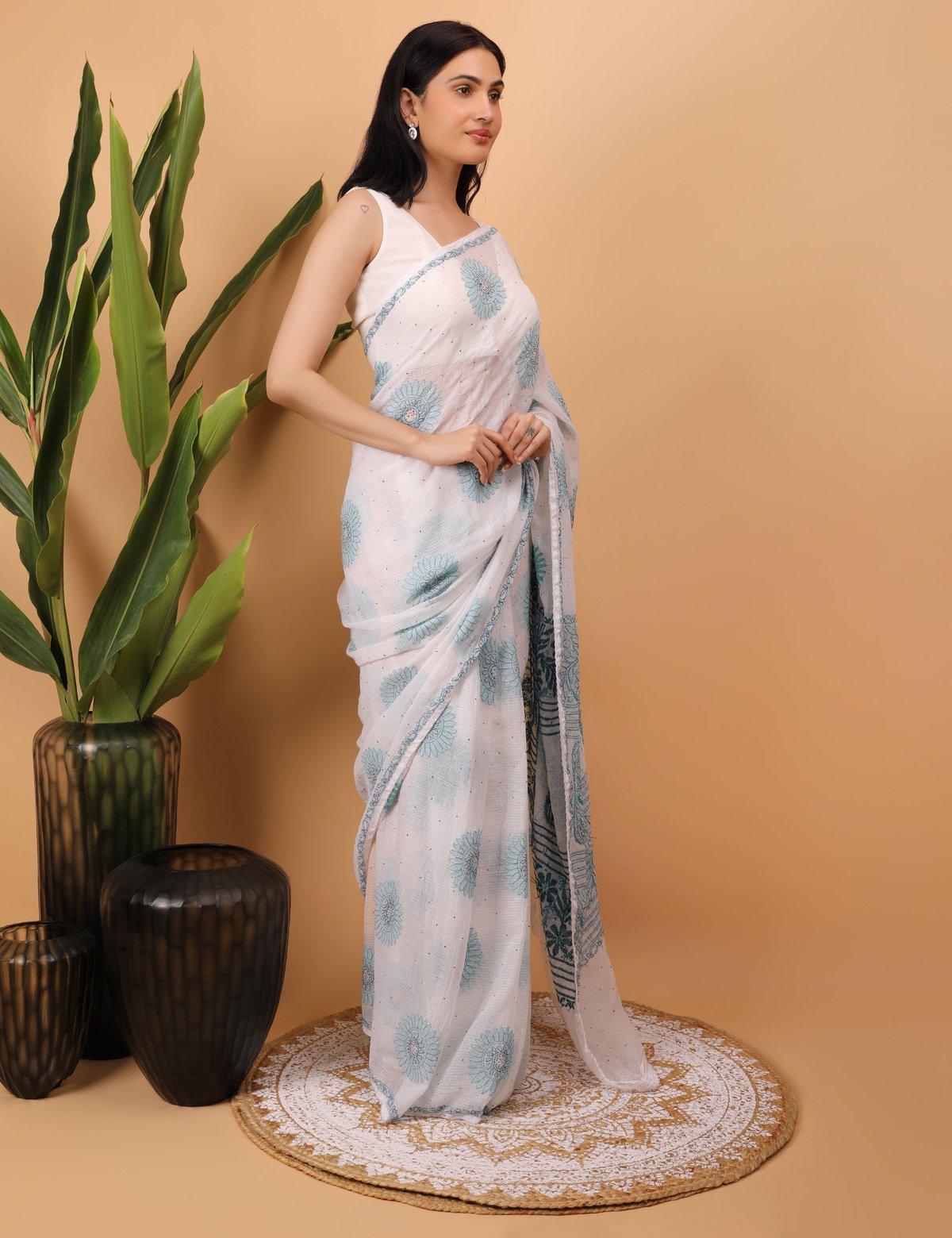 Shwet White Kota Cotton Chikankari Saree - Handcrafted Chikankari embroidery, styling example. Premium quality fabric.
