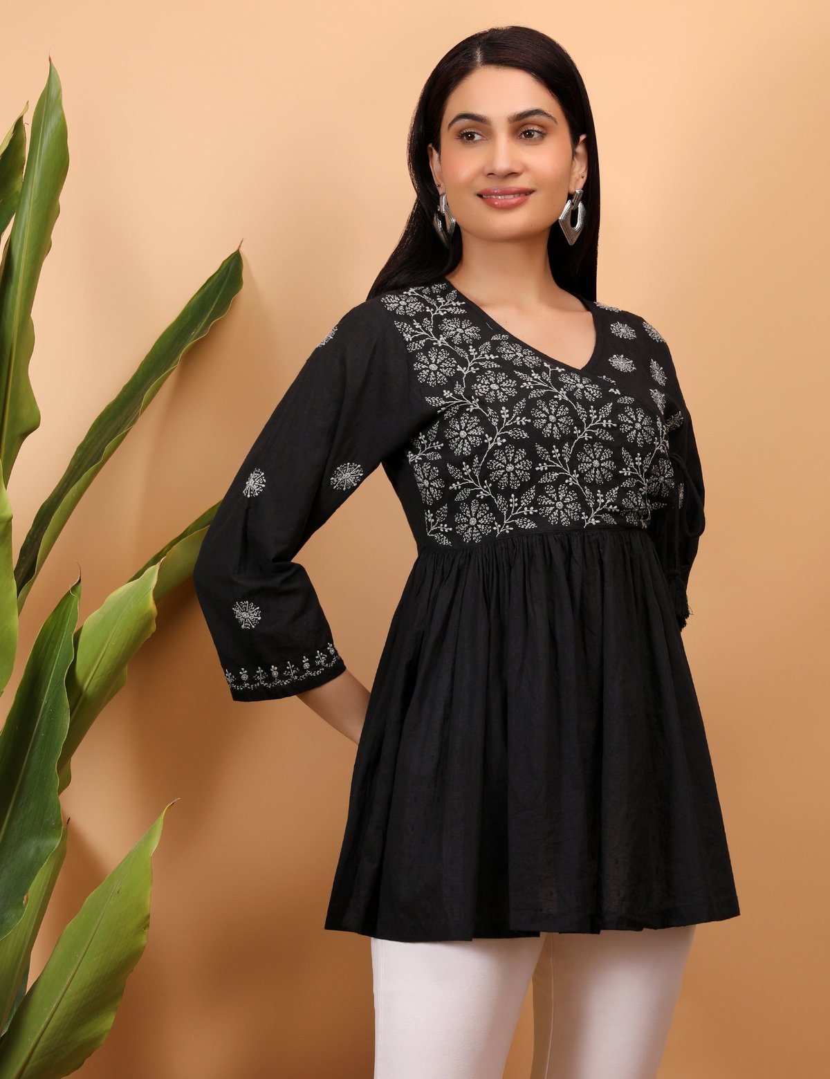 Shwet Women Black Chikankari Angarkha Top - Handcrafted Chikankari embroidery, styling example. Premium quality fabric.
