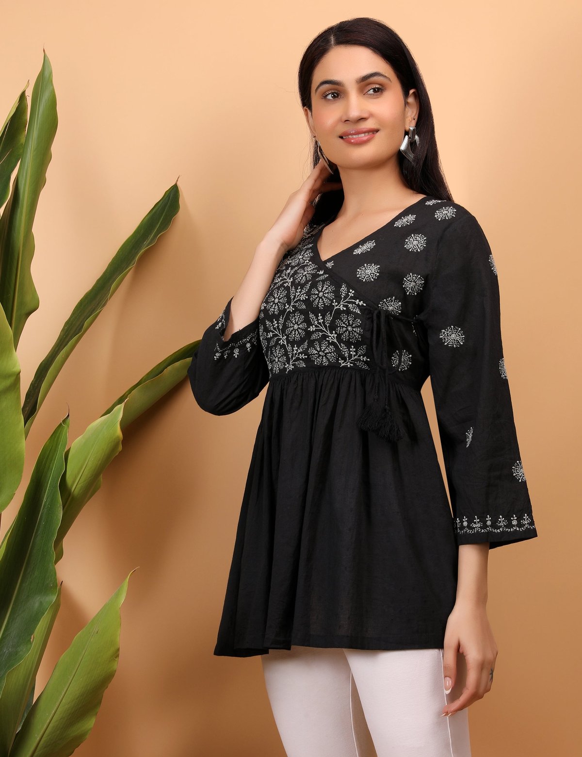 Shwet Women Black Chikankari Angarkha Top - Handcrafted Chikankari embroidery. Premium quality fabric.