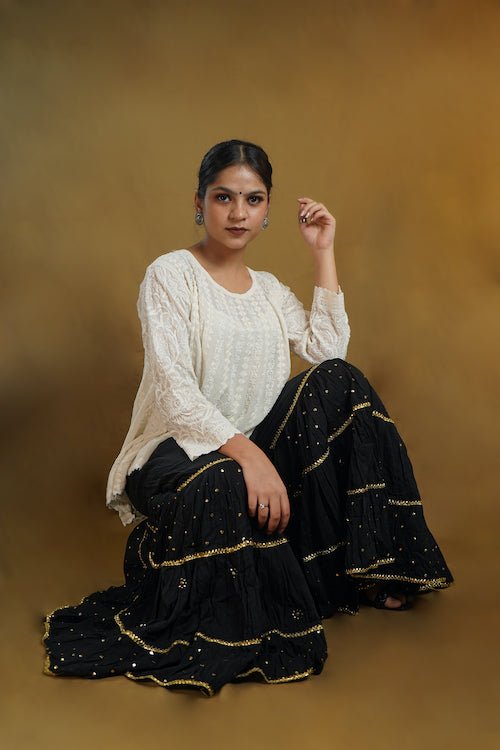 shwet pestal hues black chikankari cotton Garara - Handcrafted Chikankari embroidery, front view. Premium quality fabric.