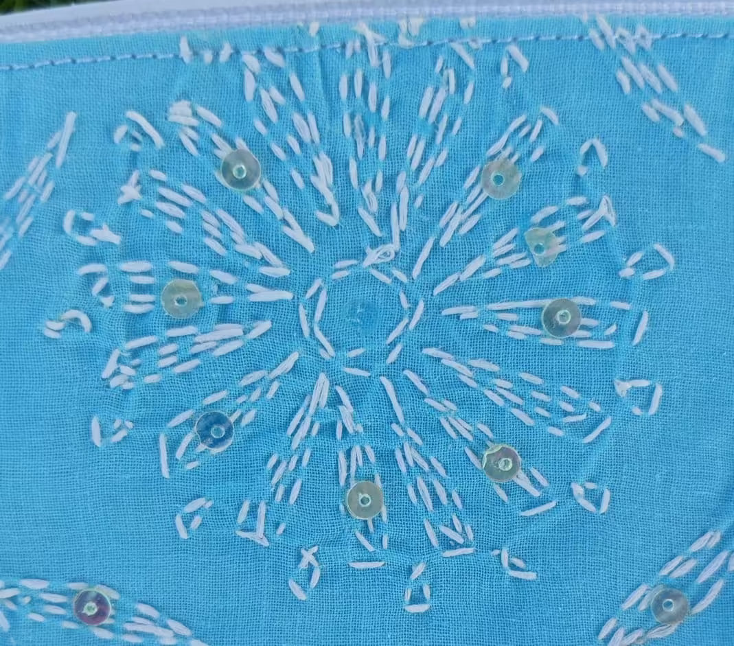 Blue fabric with white Chikankari pattern